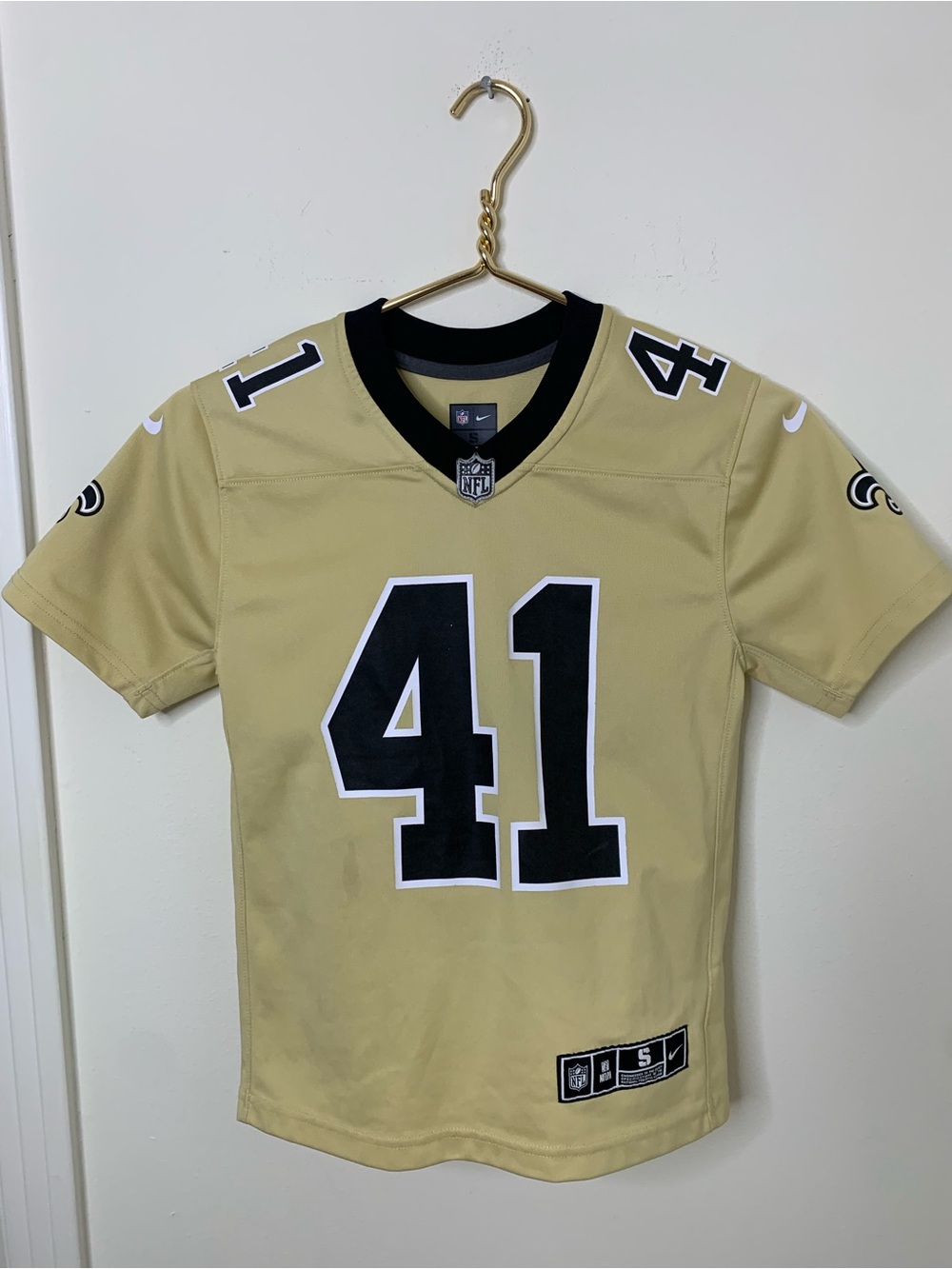 NFL jersey football youth # 41 sz small or 8 New Orleans Saints Gold